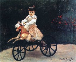 Jean Monet auf einem Mechanischer Pferde